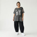 Grauschwarze Oversize Tunika aus Jersey mit Print Meshdetails und asymmetrischem Saum