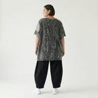 Grauschwarze Oversize Tunika aus Jersey mit Print Meshdetails und asymmetrischem Saum