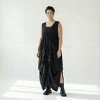 Schwarzes Oversize Ballonkleid mit V-Ausschnitt Bindetail und zwei großen Fronttaschen