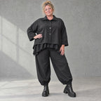 Schwarze Denimballonhose mit Stretch und bequemem Schlupfbund in weiter Passform